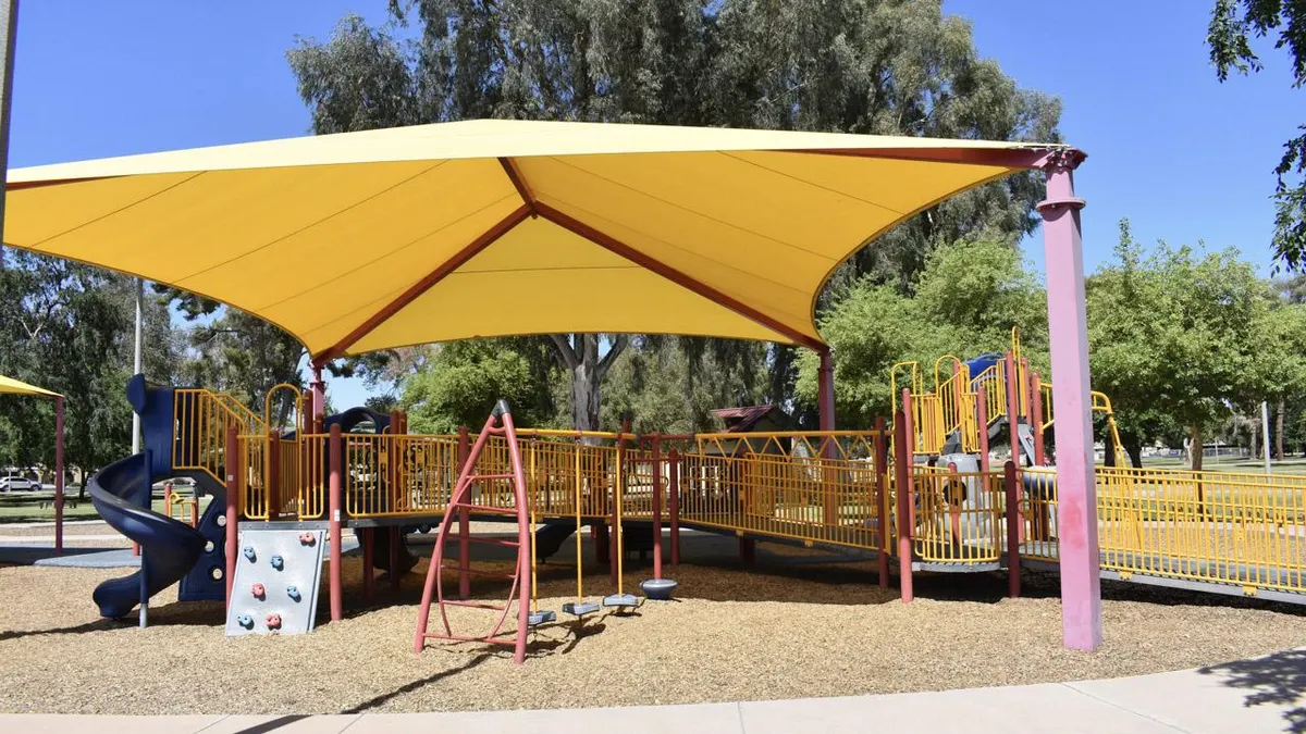 Shaded playground at Arrowhead Meadows Park — Chandler, AZ