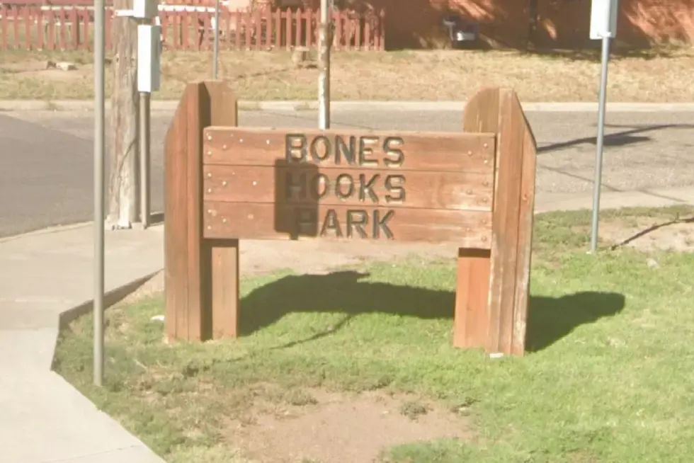 Playground with swings and slides at Bones Hooks Park — Amarillo, TX