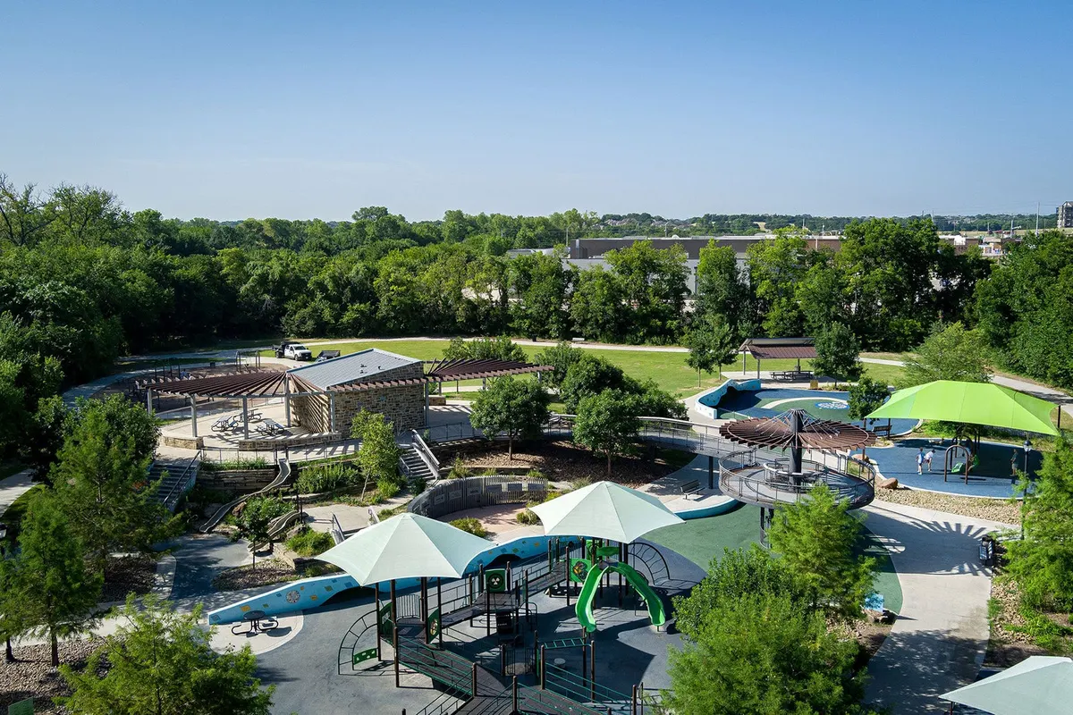 Shaded playground at Bonnie Wenk Park, McKinney, TX