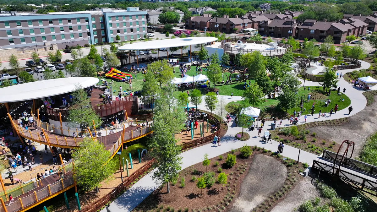 Water play area and climbing wall at Camden Park — Houston, TX