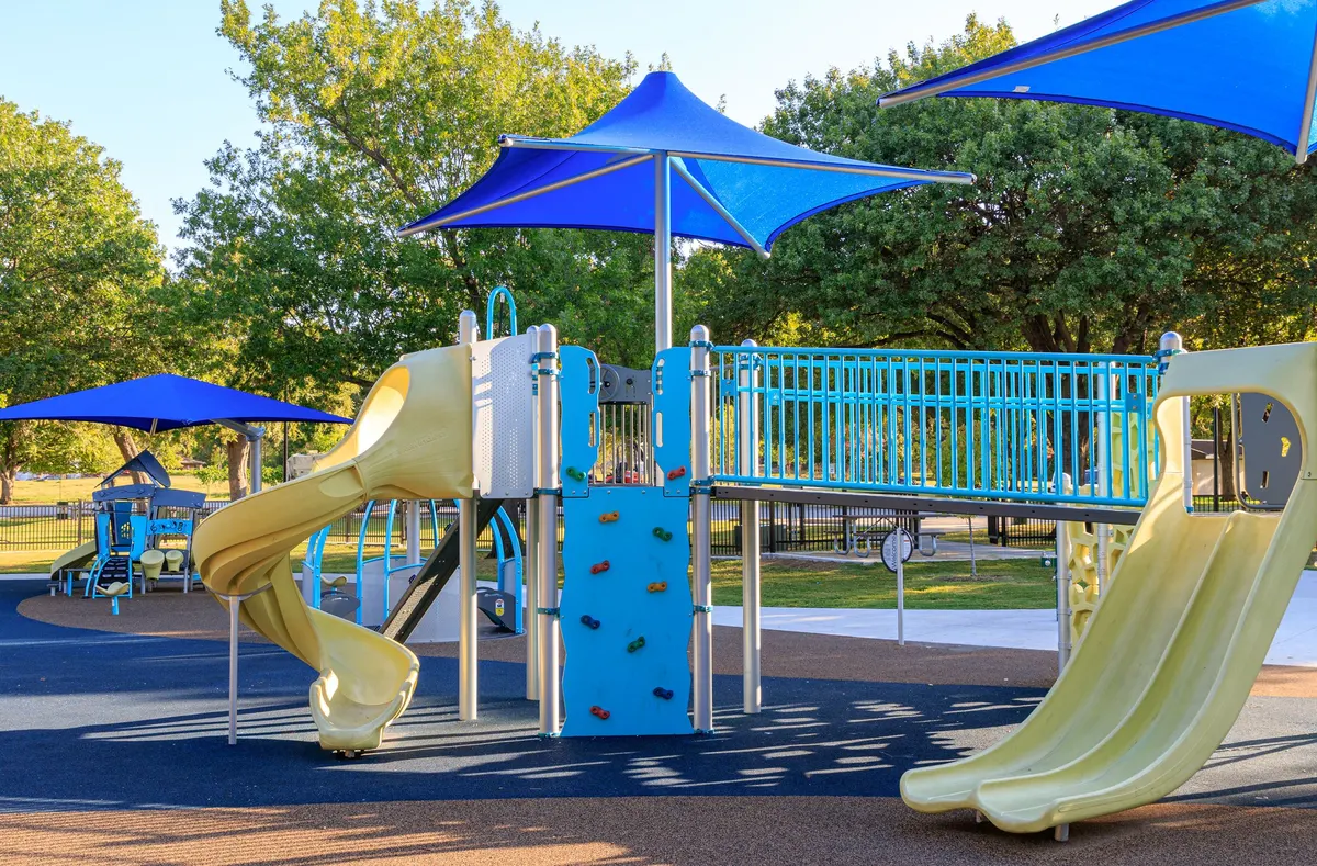 Central Park Garland playground and splash pad on a sunny day