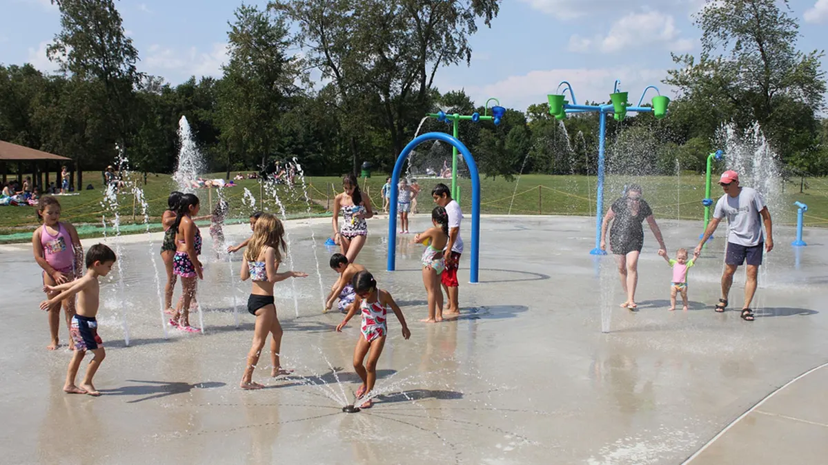 Zero-depth splash pad and playground at City of Splendora Heritage Park — Splendora, TX