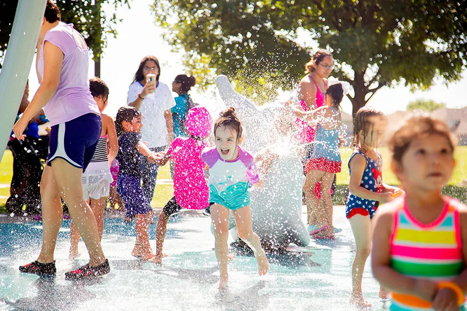 Don Misenhimer Park splash pad whale and palm tree fountains — Arlington, TX