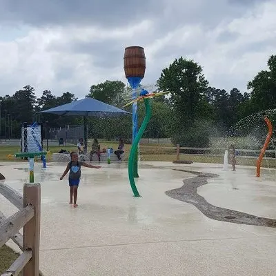 Splash pad and playground at Dr. MLK Jr. Park — Conroe, TX