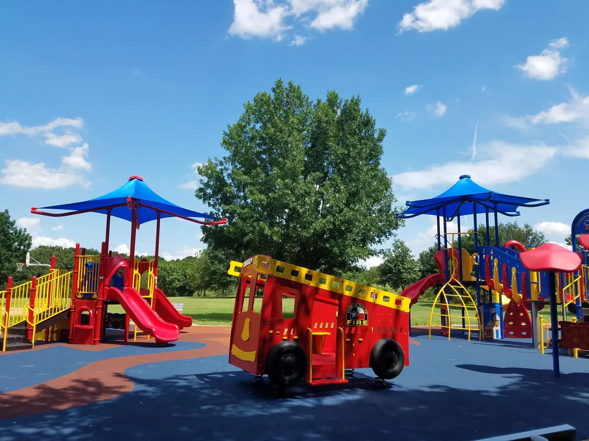 Shaded playground at Gaston Park, Flower Mound, TX