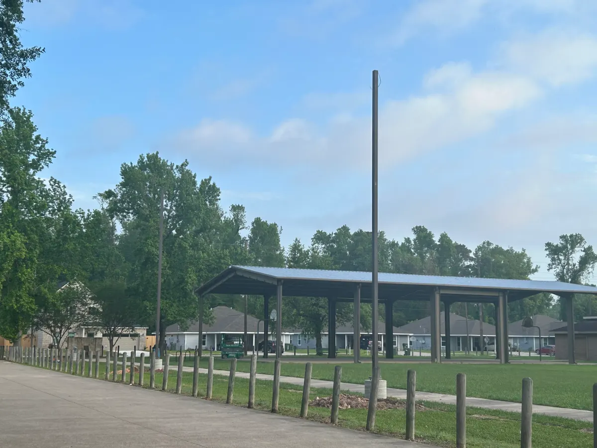 Playground and open field at Henderson Day Family Memorial Park — Dayton, TX