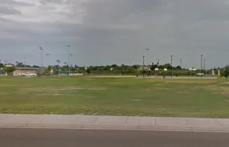 Playground equipment and duck pond at Independence Hills Park — Laredo, TX