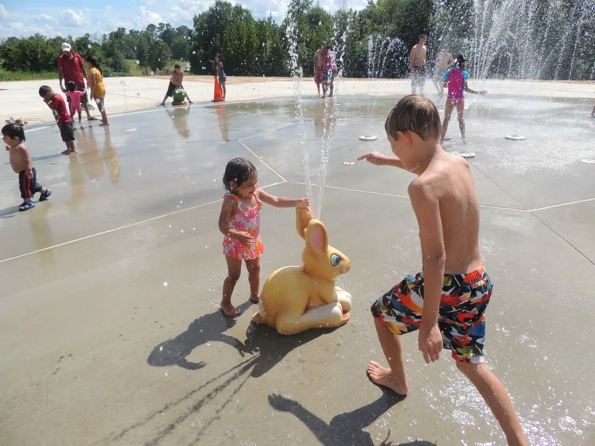 Jack Mann Splash Pad at Lear Park — kids playing in water jets, Longview TX