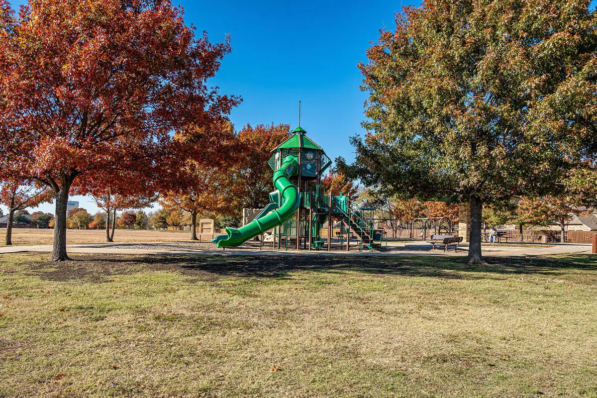 Play structures at John M. Whisenant Park — McKinney, TX