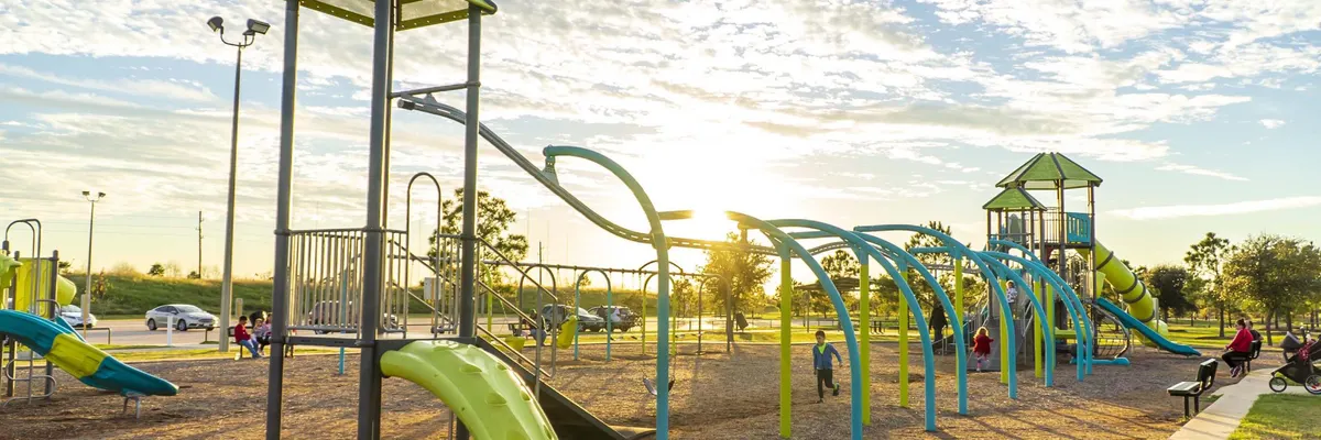 Playground structure by the lake at John Paul Landing Park — Cypress, TX