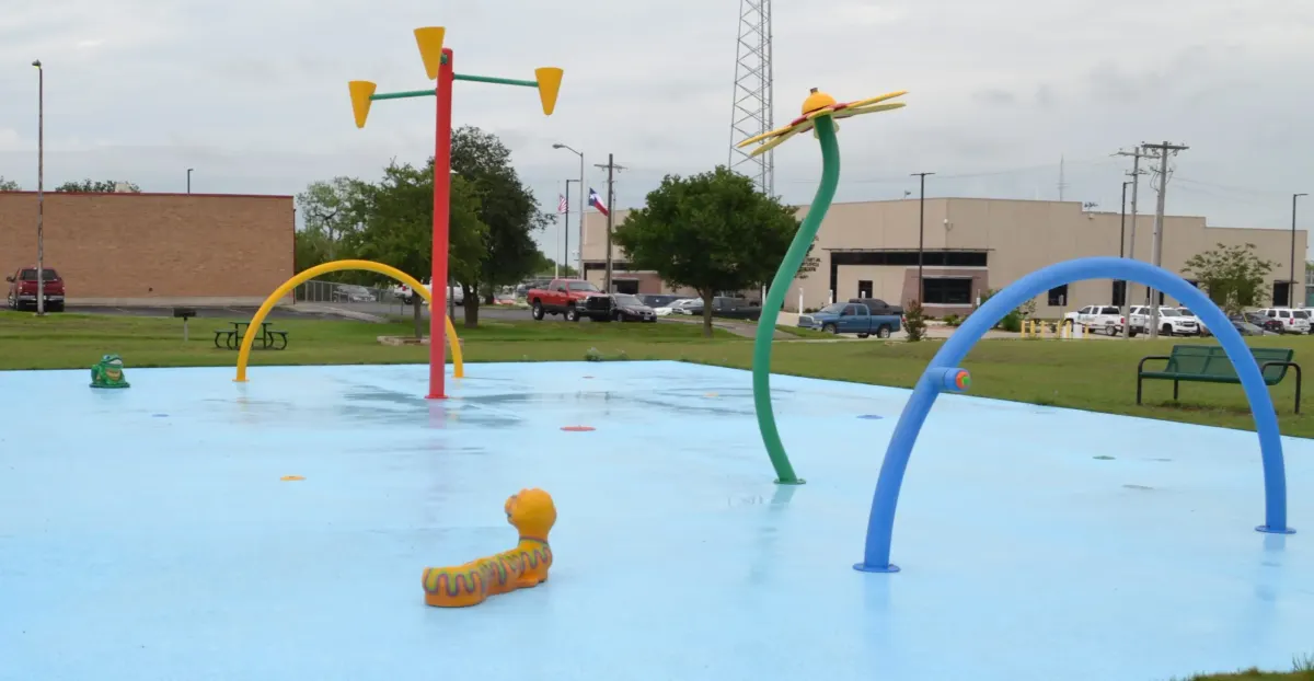 Playground and splash zone at Karnes City Park — Karnes City, TX