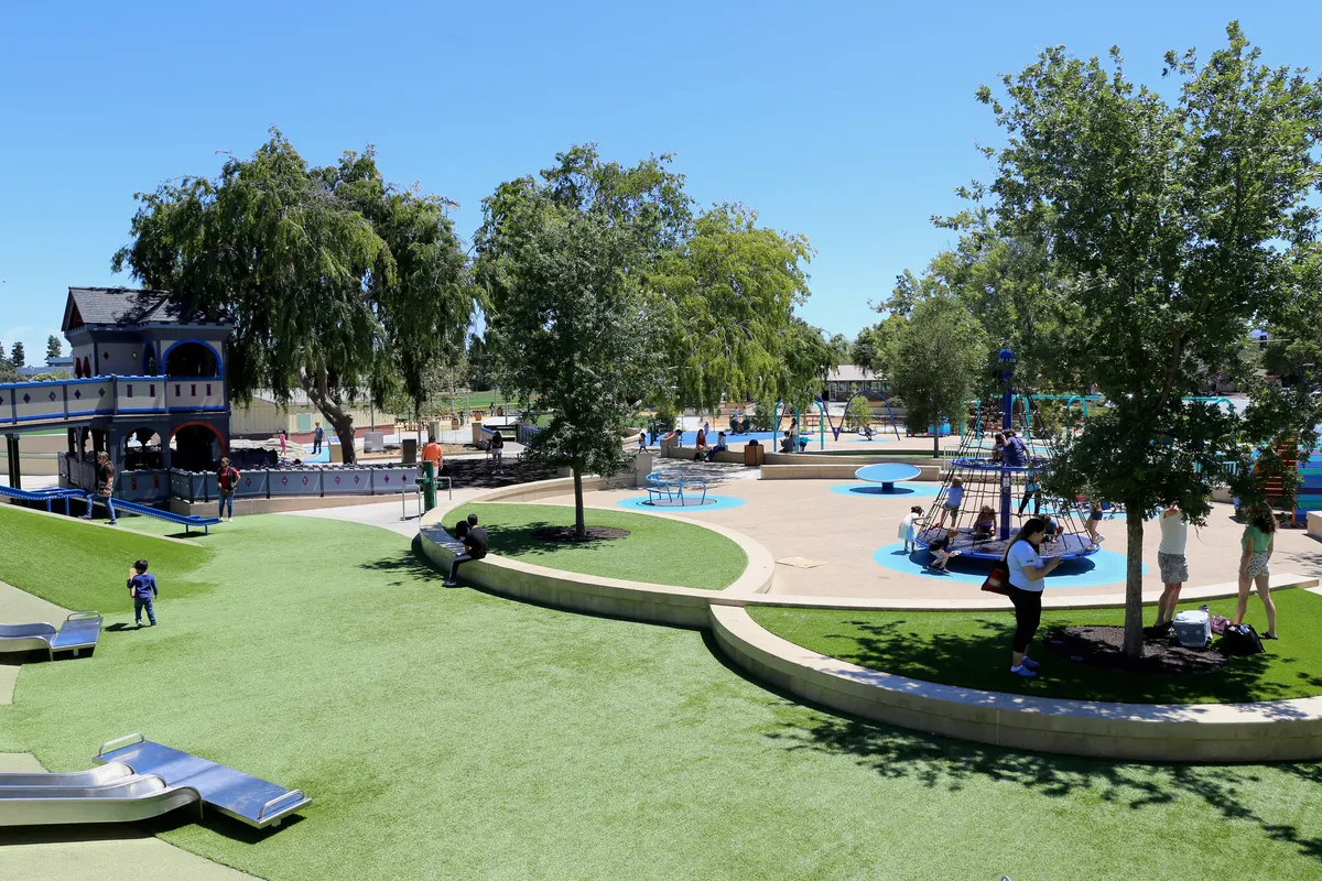 Magical Bridge all-abilities playground with accessible carousel and sensory play at Fair Oaks Park — Sunnyvale, CA