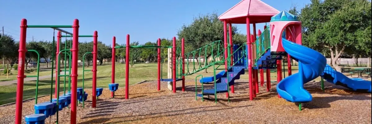 Divided age-zone playground at Malcolm E. Beckendorff Family Park — Katy, TX
