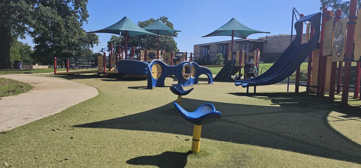 Memorial Park Lewisville playground equipment on a sunny day