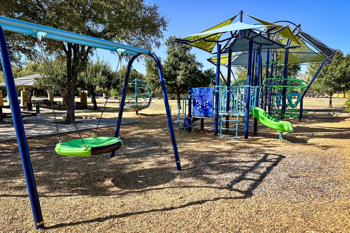 Mesa Village Park shaded playground — Round Rock, TX