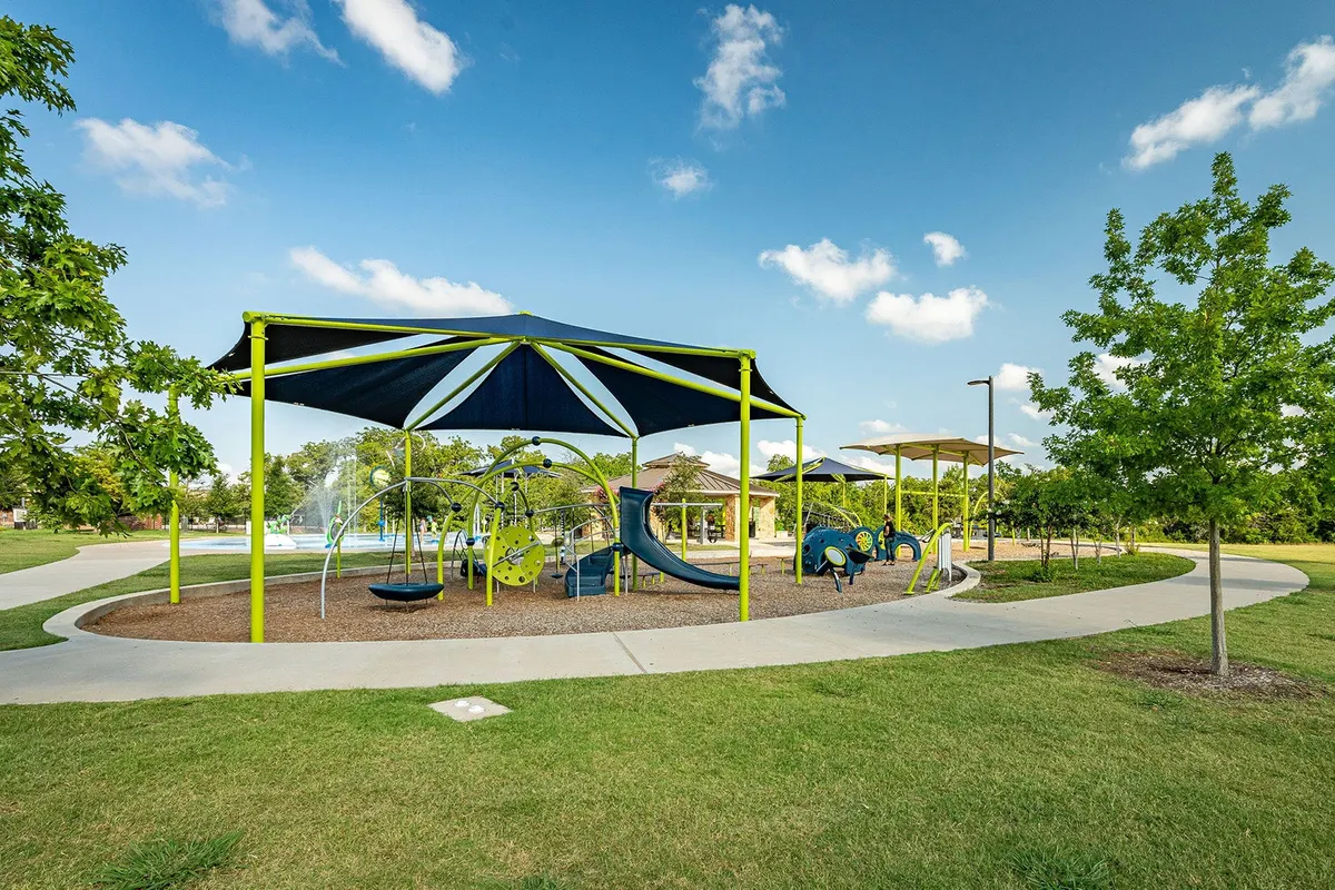 Shaded playground at Prestwyck Park, McKinney, TX