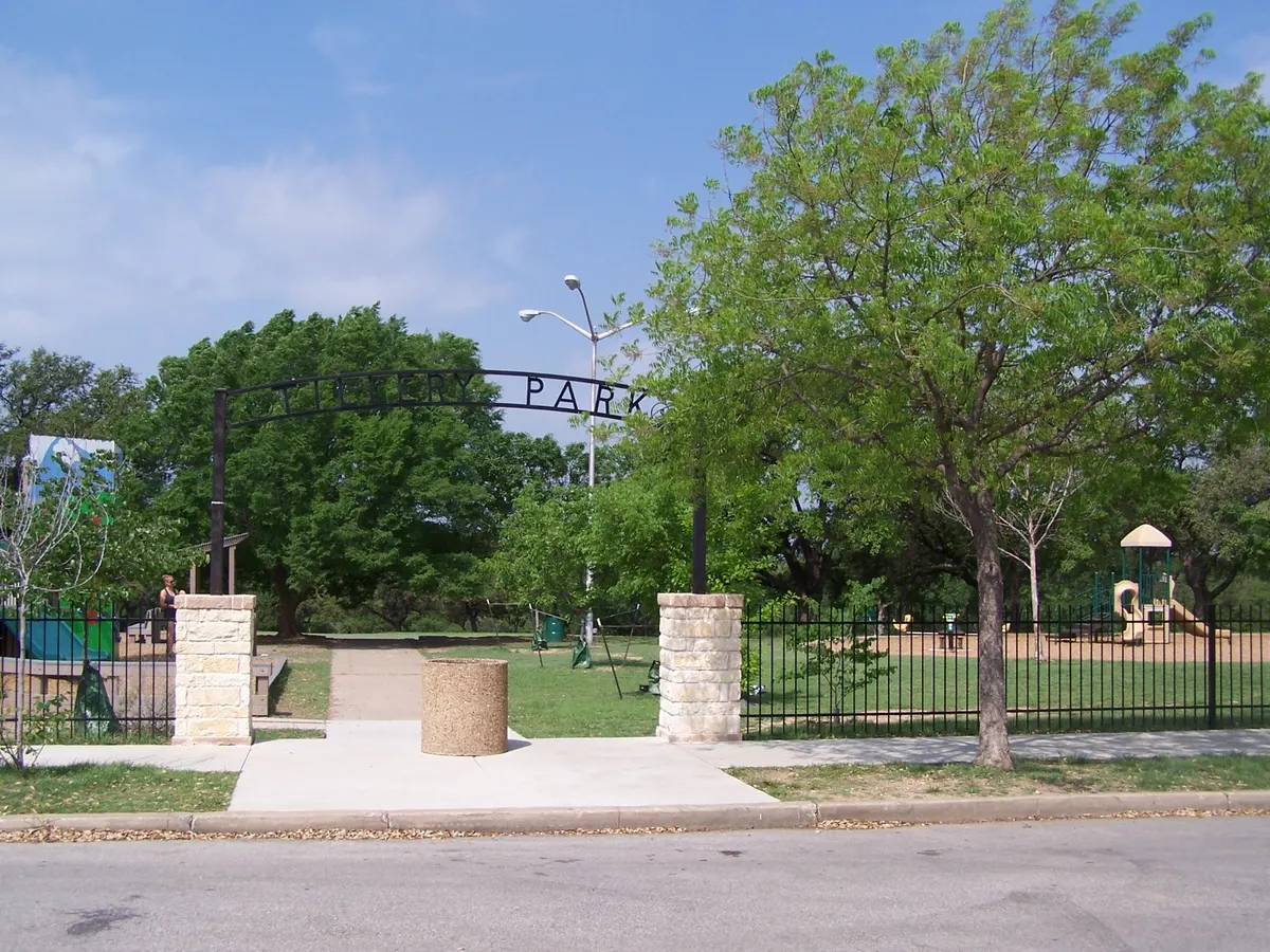 Toddler playground with swings and splash pad at Tillery Park — Fort Worth, TX