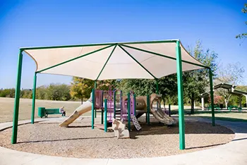 Shaded playground at Twin Creeks Park, Allen, TX
