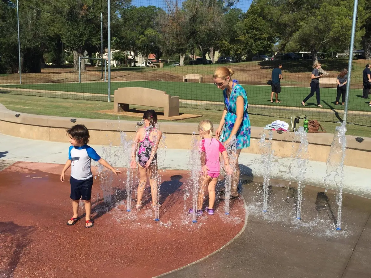 Neighborhood-scale playground and picnic benches at Yarborough Park — Lake Elsinore, CA