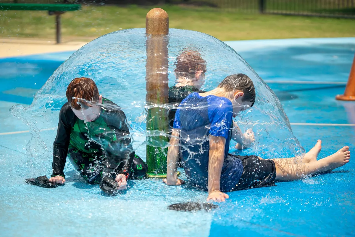Fenced sprayground at Zube Park Spray Park — Hockley, TX